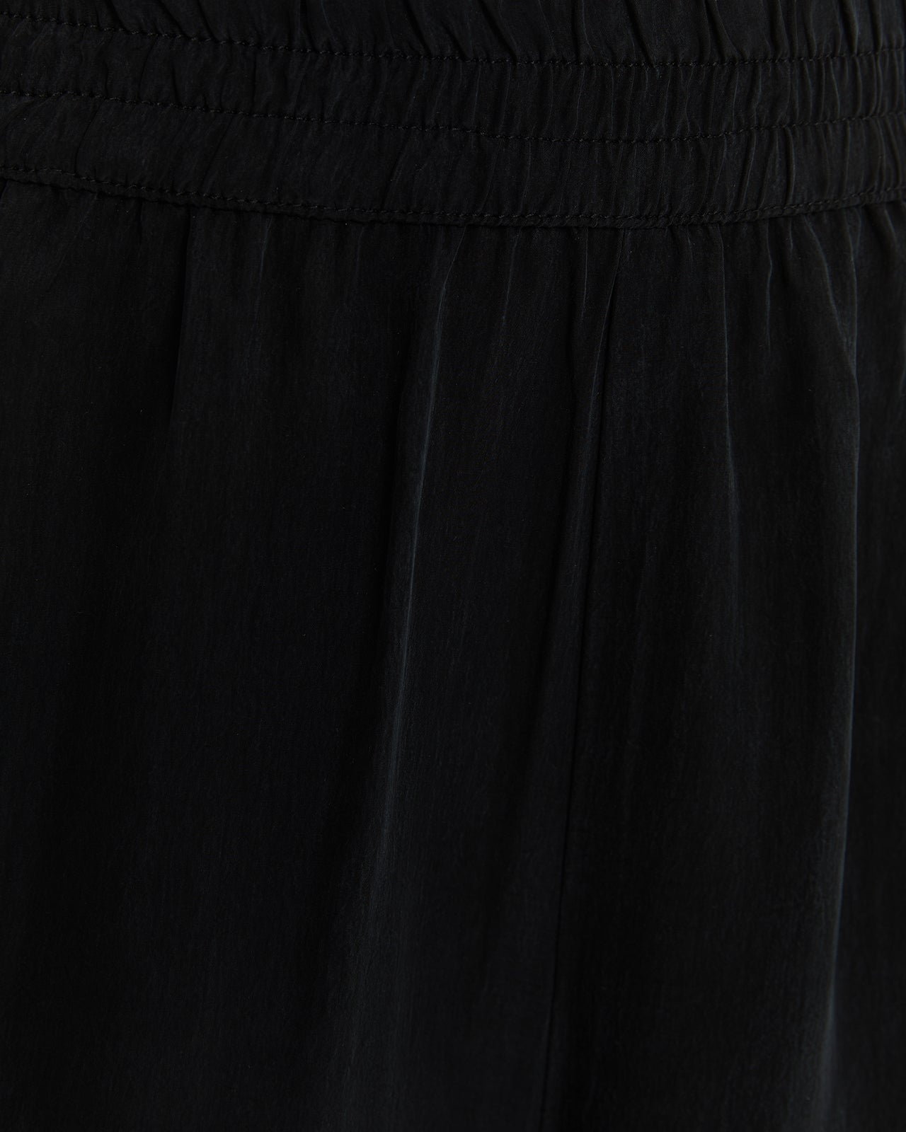 Pantalón largo con goma en la cintura y tejido de cupro