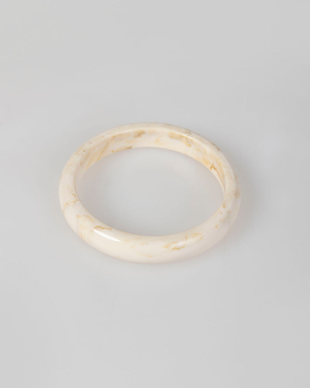 Brazalete beige rígido