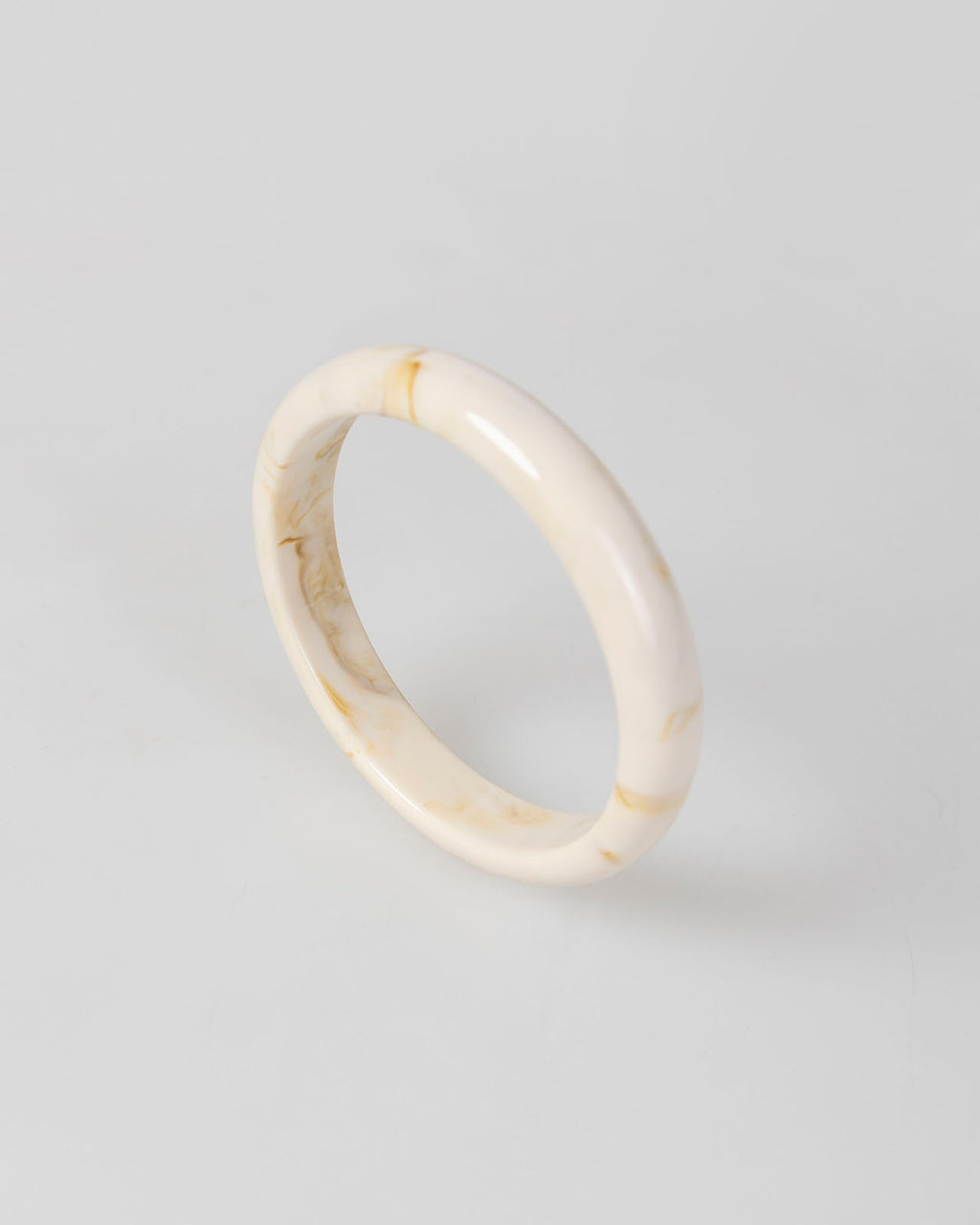 Brazalete beige rígido