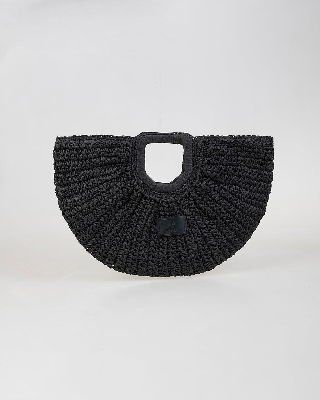 Bolso media luna trenzado