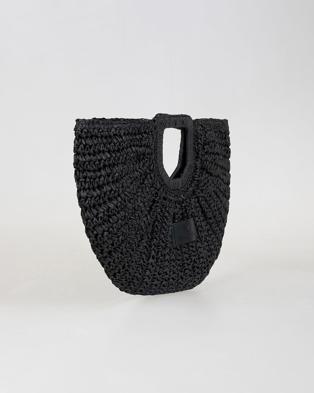 Bolso media luna trenzado