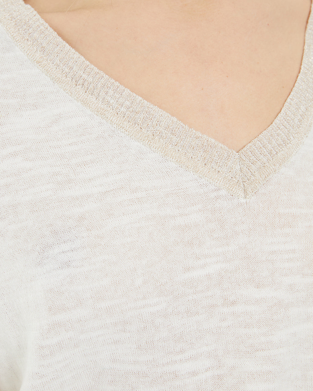 Jersey cuello pico de manga corta con detalle tira escote
