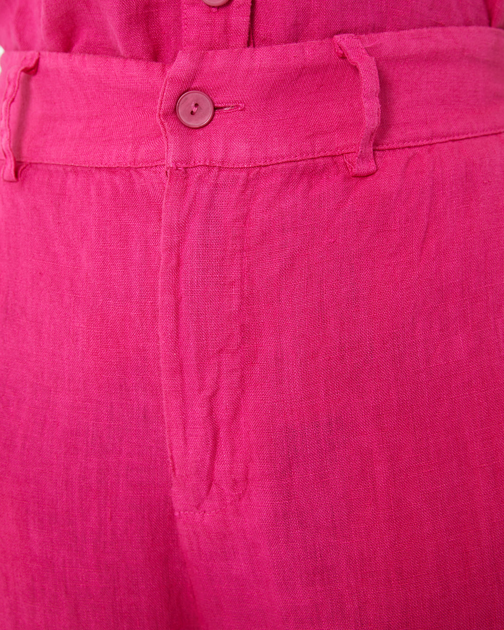 Pantalón de lino con cierre cremallera y botón