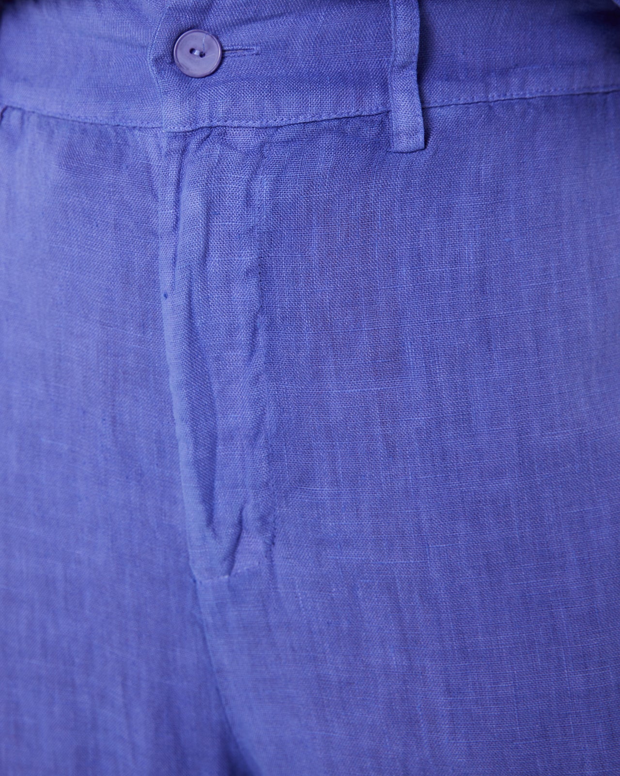Pantalón de lino con cierre cremallera y botón