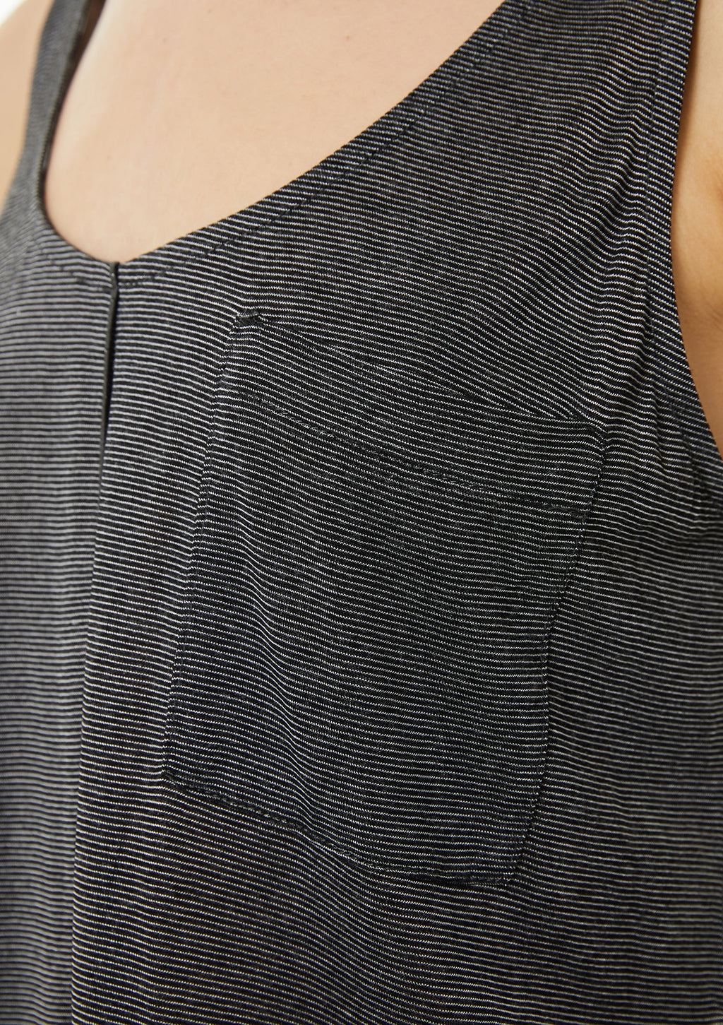 Top de tirantes tejido especial bolsillo plastrón delantero