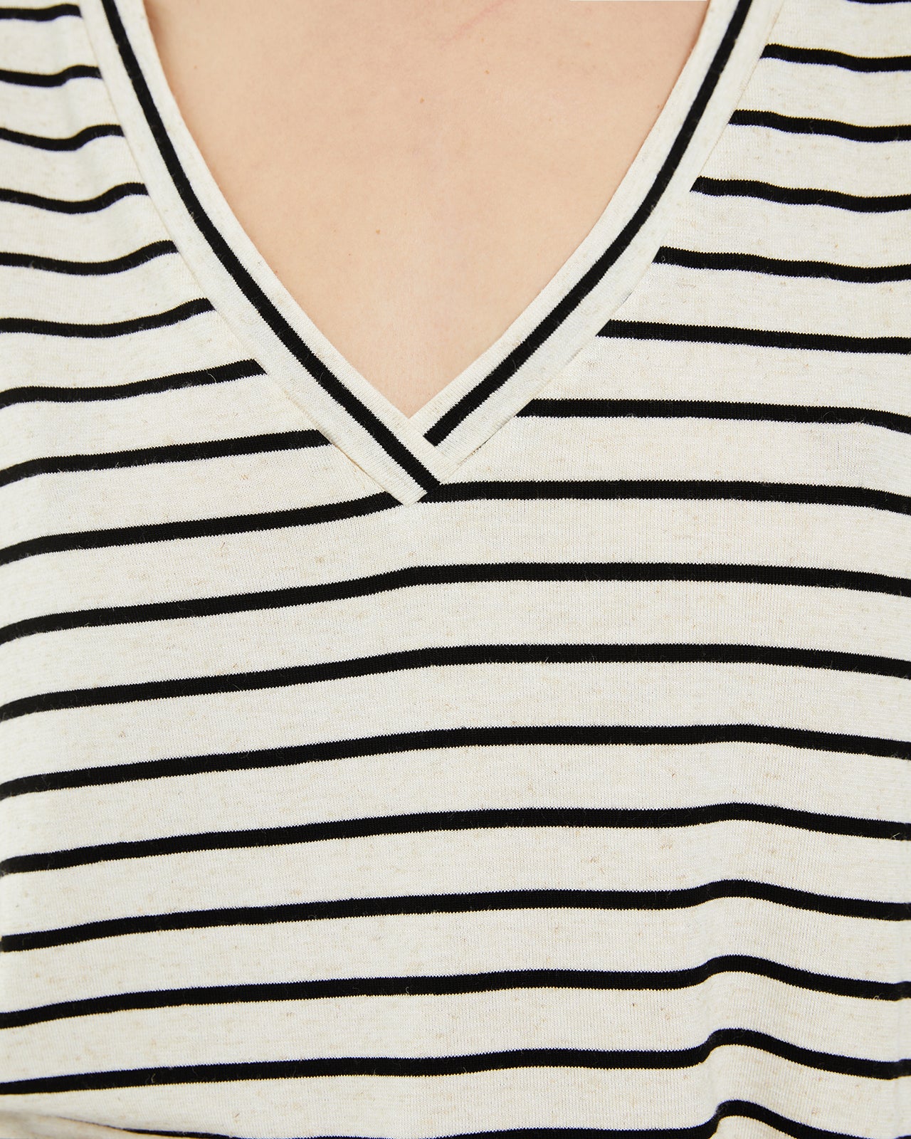 Top de rayas sin mangas escote pico